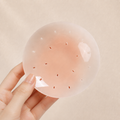 The Breathable Nipple Cover, a glue-free nude silicone nipple cover with breathing holes