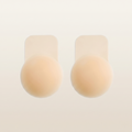 The Lift Nipple Cover, a nude silicone petal nipple cover with a lift tab