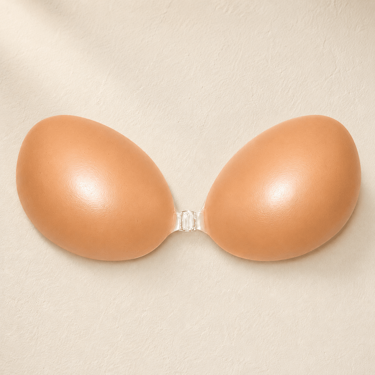 The Push-Up Bra, a nude silicone adhesive push-up bra with a reinforced front clip
